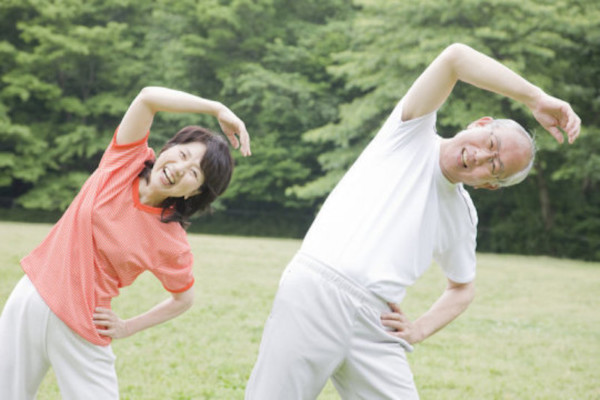 People stretching outside